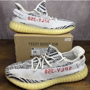 Yeezy Zebra Pattern Sneakers with Red Accents